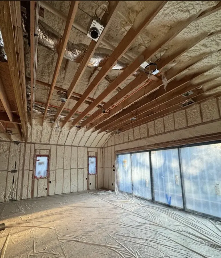 Interior walls and ceiling insulated with spray foam during new construction in Coral Gables